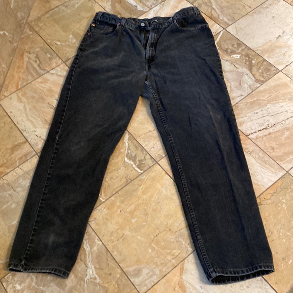 Levi Mens faded black denim jeans. Size 40 x 34.